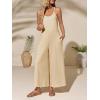 imageCicy Bell Womens Casual Wide Leg Jumpsuits Summer Spaghetti Strap Sleeveless Cut Out Loose Long Pant Rompers with PocketsBeige