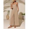 imageCicy Bell Womens Casual Wide Leg Jumpsuits Summer Spaghetti Strap Sleeveless Cut Out Loose Long Pant Rompers with PocketsKhaki